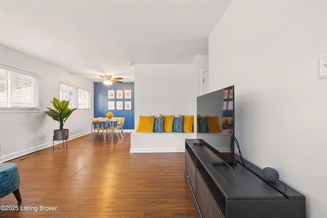 3113 Aires Ct, Louisville, KY 40220 - living room featuring dark wood-type flooring, ceiling fan, and baseboards