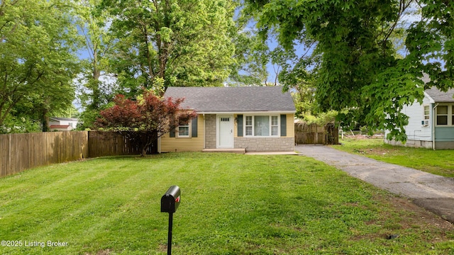 7802 Edna M Rd, Louisville, KY 40258 - view of front of property featuring stone siding, asphalt driveway, and roof with shingles