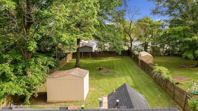 7802 Edna M Rd, Louisville, KY 40258 - view of yard with a storage unit and an outdoor structure
