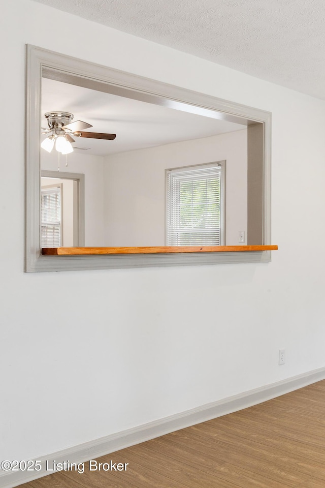 7802 Edna M Rd, Louisville, KY 40258 - unfurnished room featuring wood finished floors and ceiling fan