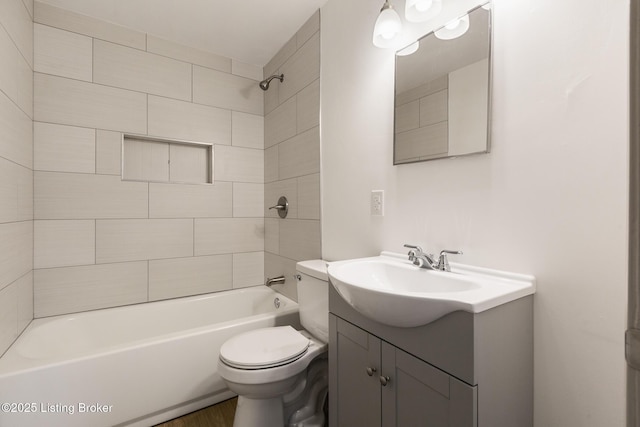 7802 Edna M Rd, Louisville, KY 40258 - bathroom featuring toilet, vanity, bathtub / shower combination, and wood finished floors