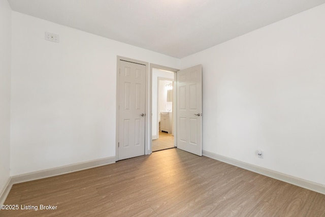7802 Edna M Rd, Louisville, KY 40258 - empty room with light wood-style floors and baseboards