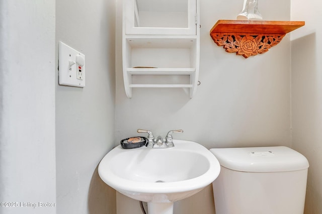 1830 Edgeland Ave, Louisville, KY 40204 - half bathroom with a sink and toilet