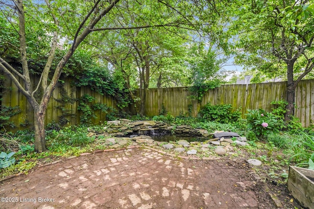 1830 Edgeland Ave, Louisville, KY 40204 - fenced backyard featuring a patio area