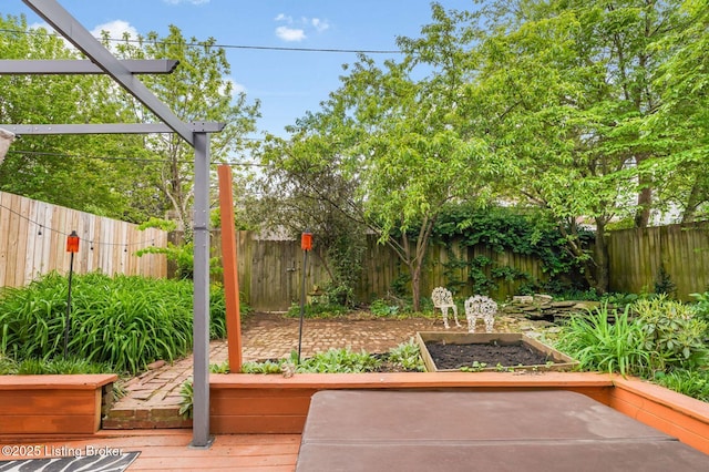 1830 Edgeland Ave, Louisville, KY 40204 - fenced backyard featuring a garden