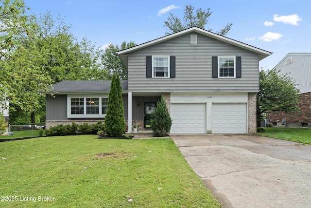 11310 Corston Ct, Louisville, KY 40241 - view of front of home with driveway, brick siding, and a garage