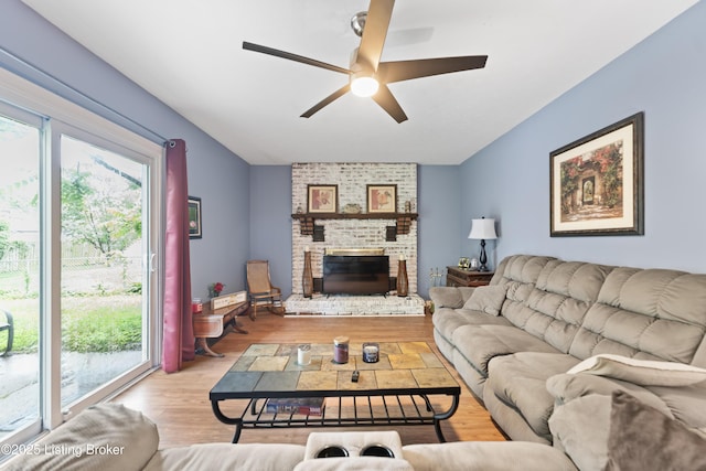 11310 Corston Ct, Louisville, KY 40241 - living area featuring ceiling fan, a brick fireplace, and light wood-type flooring