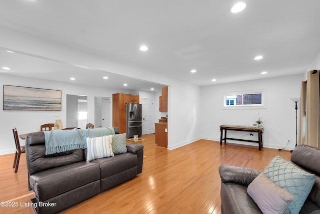 2410 Sherry Rd, Louisville, KY 40217 - living room featuring light wood-style flooring, recessed lighting, and baseboards