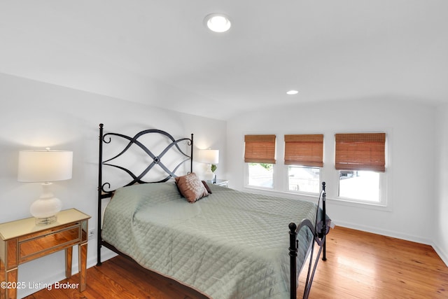 2410 Sherry Rd, Louisville, KY 40217 - bedroom with baseboards, light wood finished floors, and recessed lighting