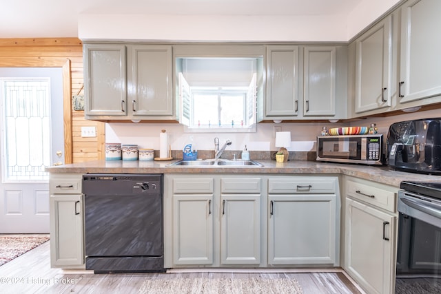 656 Hinton Hills Loop, Hardinsburg, KY 40143 - kitchen featuring black dishwasher, a sink, stainless steel microwave, and plenty of natural light