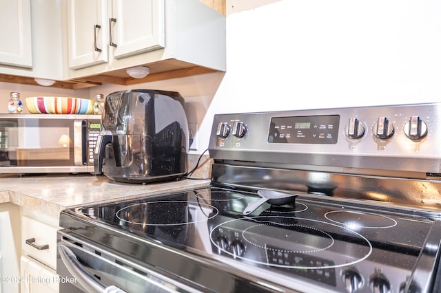 656 Hinton Hills Loop, Hardinsburg, KY 40143 - kitchen view of stainless steel appliances and white cabinetry