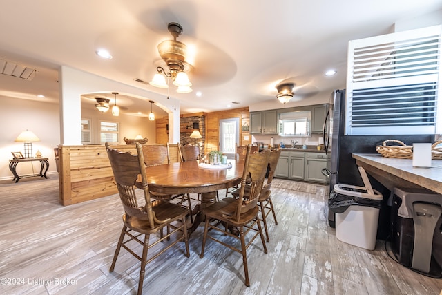 656 Hinton Hills Loop, Hardinsburg, KY 40143 - dining room with a ceiling fan, light wood-style flooring, recessed lighting, and arched walkways