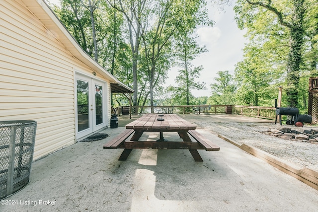 656 Hinton Hills Loop, Hardinsburg, KY 40143 - view of patio with french doors, a deck, central air condition unit, grilling area, and view of wooded area