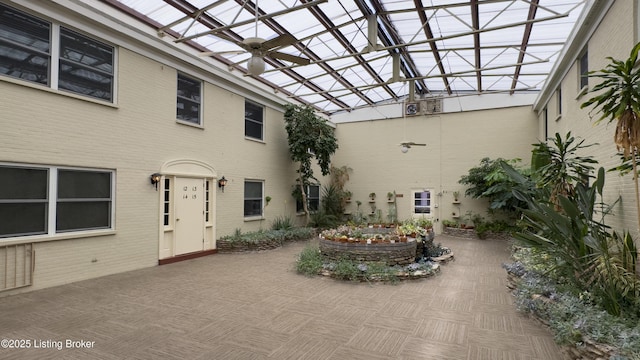 view of patio / terrace featuring a pergola and a ceiling fan