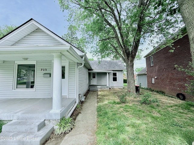 713 E Hill St, Louisville, KY 40217 - view of front of property featuring a porch