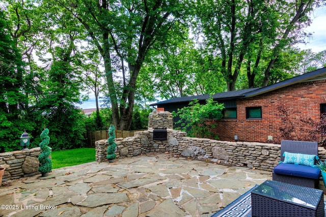 view of patio / terrace with a fireplace