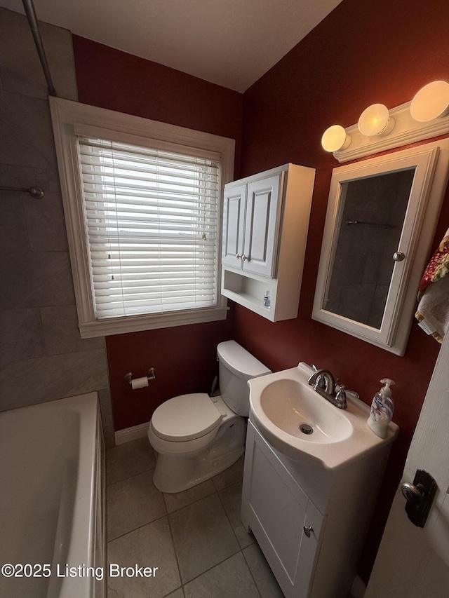 612 Ervay Ave, Louisville, KY 40217 - bathroom featuring tile patterned floors, toilet, vanity, a shower, and a tub to relax in
