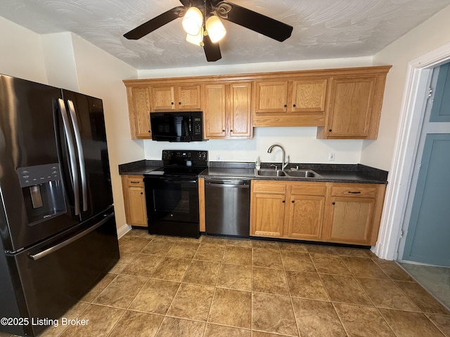612 Ervay Ave, Louisville, KY 40217 - kitchen with black appliances, a sink, dark countertops, and ceiling fan