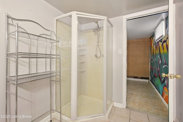 3745 Rosemont Blvd, Louisville, KY 40218 - bathroom with a shower stall, baseboards, and tile patterned flooring