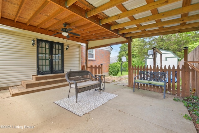 3745 Rosemont Blvd, Louisville, KY 40218 - view of patio featuring ceiling fan, fence, entry steps, and a storage unit