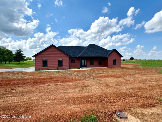 view of front of house with a shingled roof