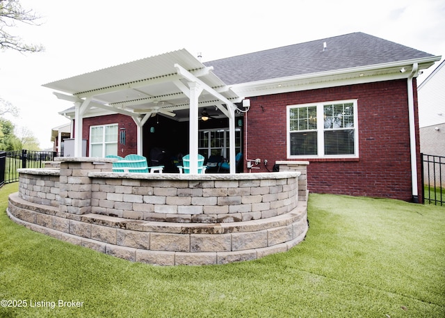 8812 Sanctuary Ln, Louisville, KY 40291 - rear view of house with a ceiling fan, a shingled roof, and brick siding