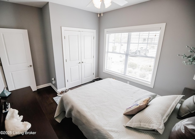 8812 Sanctuary Ln, Louisville, KY 40291 - bedroom featuring a closet, wood finished floors, and baseboards