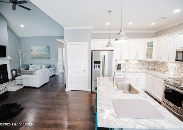 8812 Sanctuary Ln, Louisville, KY 40291 - kitchen with stainless steel appliances, a sink, tasteful backsplash, open floor plan, and white cabinets