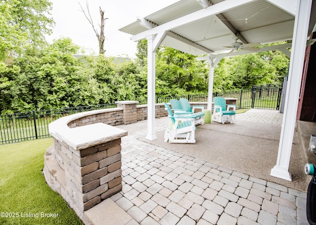 8812 Sanctuary Ln, Louisville, KY 40291 - view of patio / terrace featuring a ceiling fan and view of wooded area