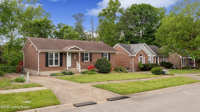 7208 Ridge Creek Rd, Louisville, KY 40291 - ranch-style house featuring brick siding, a front lawn, and driveway