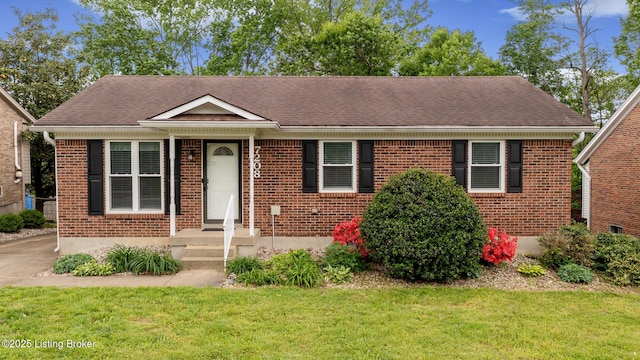 7208 Ridge Creek Rd, Louisville, KY 40291 - bungalow-style house with a front yard, a shingled roof, and brick siding