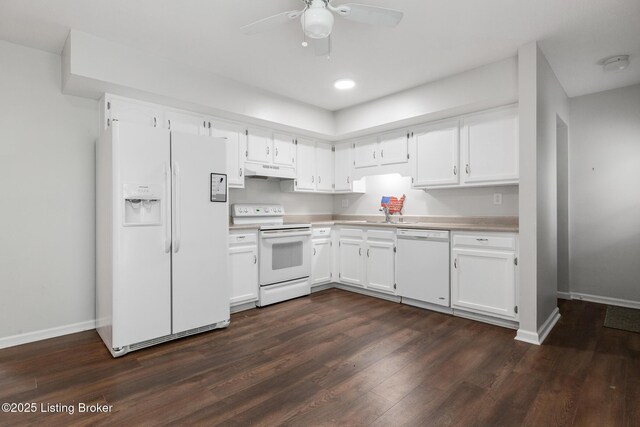 7208 Ridge Creek Rd, Louisville, KY 40291 - kitchen with white appliances, under cabinet range hood, dark wood finished floors, and white cabinetry