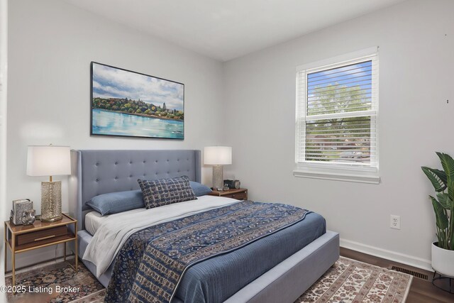 7208 Ridge Creek Rd, Louisville, KY 40291 - bedroom with baseboards and wood finished floors