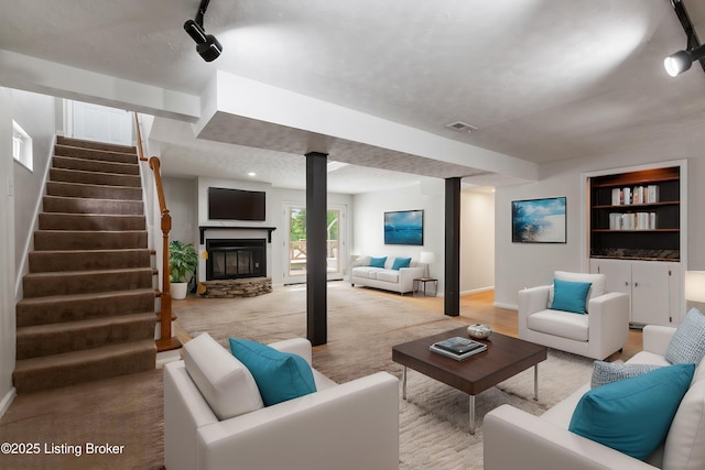 7208 Ridge Creek Rd, Louisville, KY 40291 - living room with stairway, a fireplace, built in shelves, and baseboards