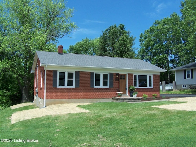 132 Goodloe Ave, Bloomfield, KY 40008 - ranch-style house with brick siding, a chimney, a front yard, and roof with shingles