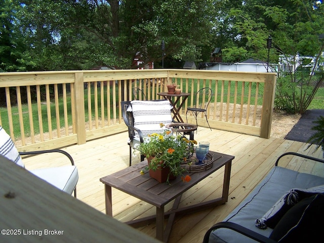 132 Goodloe Ave, Bloomfield, KY 40008 - wooden terrace with a yard and view of wooded area