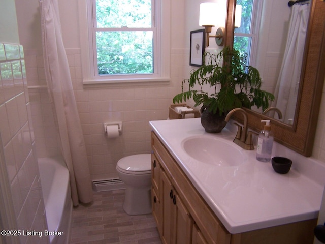 132 Goodloe Ave, Bloomfield, KY 40008 - full bath featuring toilet, vanity, baseboard heating, and tile walls
