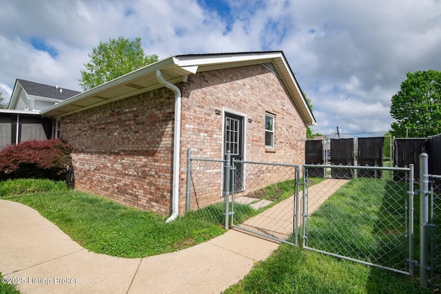 395 Poplar Trce, Elizabethtown, KY 42701 - view of side of property featuring a gate and brick siding