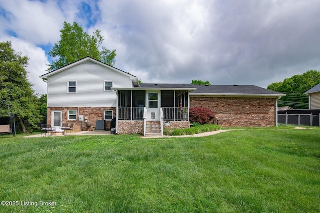 395 Poplar Trce, Elizabethtown, KY 42701 - back of house featuring a sunroom, brick siding, a patio area, and cooling unit