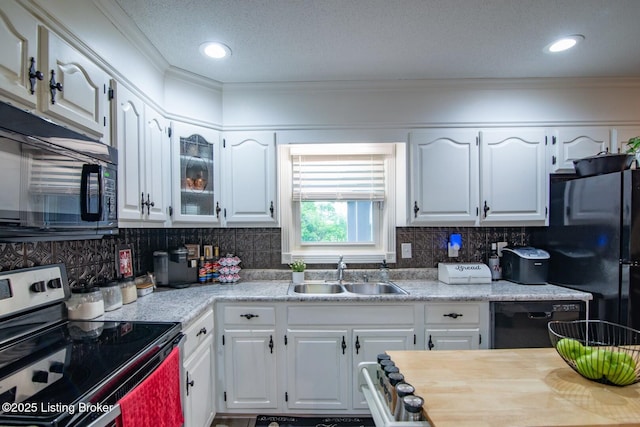 395 Poplar Trce, Elizabethtown, KY 42701 - kitchen featuring black appliances, a sink, crown molding, light countertops, and white cabinetry