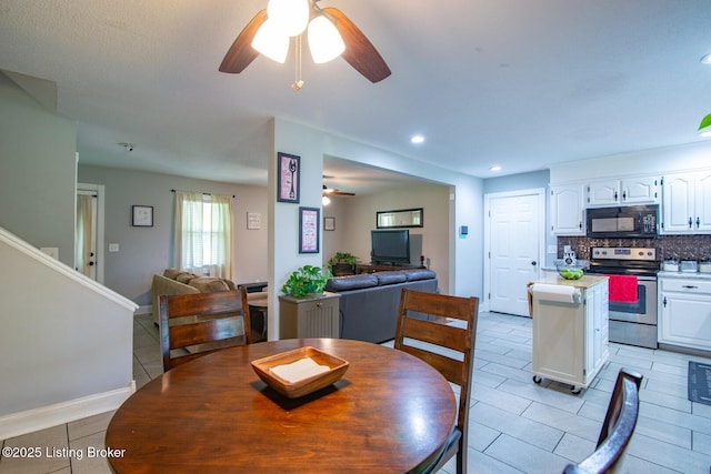 395 Poplar Trce, Elizabethtown, KY 42701 - dining space featuring light tile patterned floors, ceiling fan, recessed lighting, baseboards, and stairway