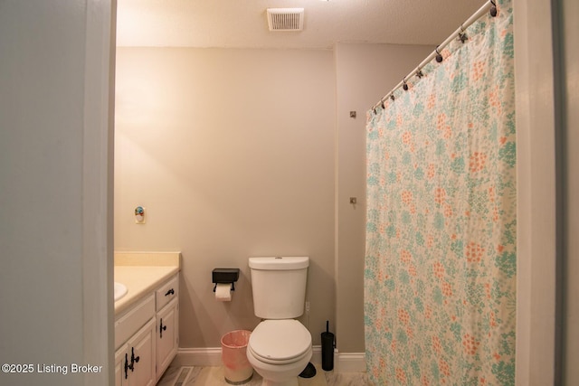 395 Poplar Trce, Elizabethtown, KY 42701 - full bath featuring vanity, baseboards, toilet, and curtained shower