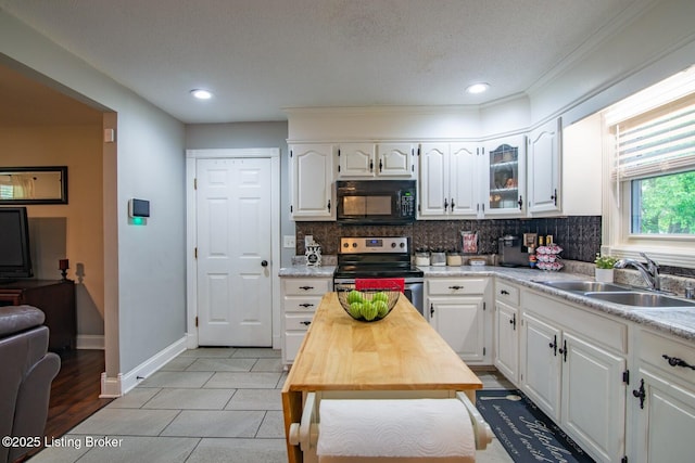 395 Poplar Trce, Elizabethtown, KY 42701 - kitchen featuring black microwave, stainless steel electric range oven, a sink, tasteful backsplash, and recessed lighting