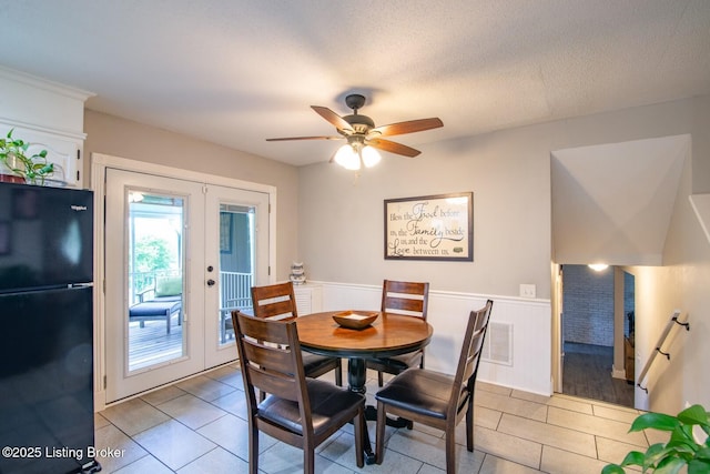 395 Poplar Trce, Elizabethtown, KY 42701 - dining room with french doors, a wainscoted wall, ceiling fan, and light tile patterned flooring