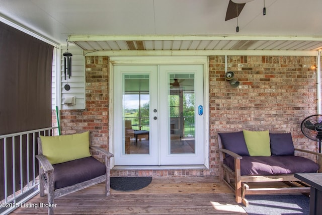 395 Poplar Trce, Elizabethtown, KY 42701 - view of exterior entry with french doors, brick siding, and a ceiling fan