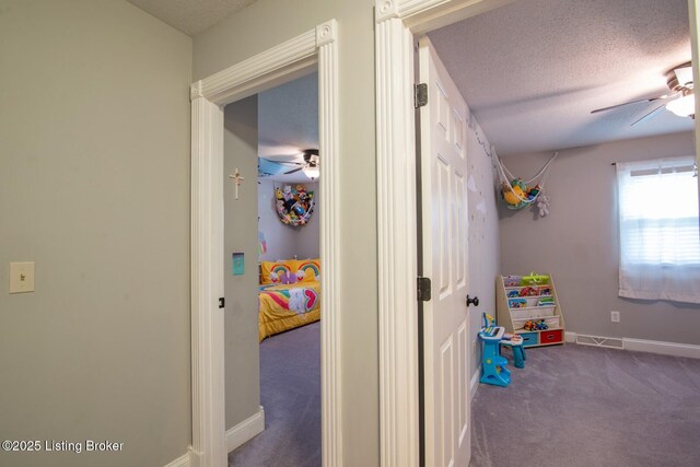 395 Poplar Trce, Elizabethtown, KY 42701 - playroom featuring a ceiling fan, carpet flooring, a textured ceiling, and baseboards