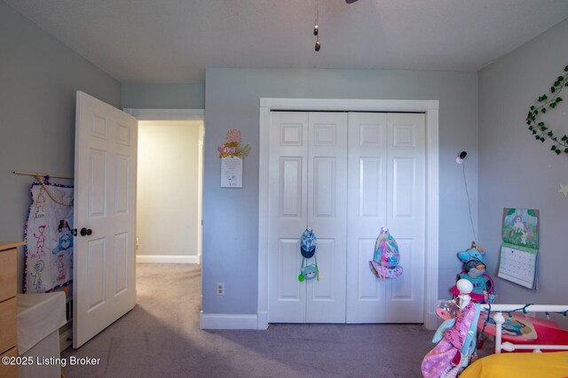 395 Poplar Trce, Elizabethtown, KY 42701 - carpeted bedroom with a closet and baseboards