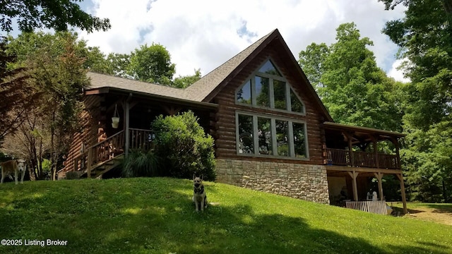 2212 Duff Rd, Leitchfield, KY 42754 - back of property featuring log exterior, a lawn, and roof with shingles