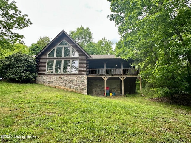 2212 Duff Rd, Leitchfield, KY 42754 - rear view of property with stone siding, log siding, a yard, and a wooden deck