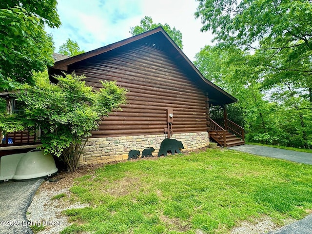 2212 Duff Rd, Leitchfield, KY 42754 - view of property exterior featuring a yard and log siding